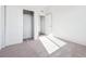 Bedroom with soft carpet, closet, and neutral walls at 487 Interlocken Blvd # 410, Broomfield, CO 80021