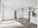 Bright, open-concept living room with hard floors and great natural light at 487 Interlocken Blvd # 410, Broomfield, CO 80021