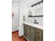 Elegant bathroom with a vintage-style vanity and modern fixtures at 5300 E Cherry Creek South Dr # 620, Denver, CO 80246
