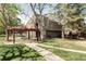 Apartment building surrounded by mature trees and landscaped grounds at 5300 E Cherry Creek South Dr # 620, Denver, CO 80246