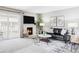 Inviting living room featuring a fireplace, modern decor, and a sliding glass door leading to outdoor space at 5300 E Cherry Creek South Dr # 620, Denver, CO 80246