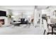 Open-concept living room flows into dining and kitchen areas, creating a spacious and inviting atmosphere at 5300 E Cherry Creek South Dr # 620, Denver, CO 80246