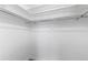Spacious closet offers ample storage with a clothes rod and shelving at 1008 N Corona St # 405, Denver, CO 80218