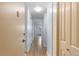 Bright hallway with wood-look floors and a neutral color palette offering a clean, modern feel at 1008 N Corona St # 405, Denver, CO 80218