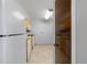 Cozy kitchen with ample cabinet space with light tile flooring at 1008 N Corona St # 405, Denver, CO 80218