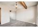 Bright bedroom with mirrored closet doors and neutral walls at 10490 W Jewell Ave # D, Lakewood, CO 80232