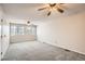 Spacious bedroom with dual ceiling fans and lots of natural light from the double windows at 10490 W Jewell Ave # D, Lakewood, CO 80232