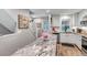 Bright kitchen with granite countertops, stainless steel appliances, and an adjacent staircase at 573 Entrada Dr, Golden, CO 80401