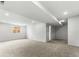 Large open basement with carpeting is a blank canvas, ready for your personal touch at 4043 E Geddes Cir, Centennial, CO 80122