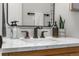 Elegant bathroom vanity featuring marble countertop and modern, black faucet at 4043 E Geddes Cir, Centennial, CO 80122