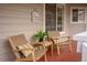 Cozy front porch area with comfortable seating and pleasant, welcoming ambiance at 4043 E Geddes Cir, Centennial, CO 80122