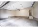 Spacious two-car garage featuring ample room for storage and easy access to the home's interior at 4043 E Geddes Cir, Centennial, CO 80122