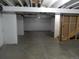 Unfinished basement area with concrete flooring and insulated walls ready for customization and storage at 4482 S Ukraine Ct, Aurora, CO 80015
