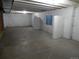 Large unfinished basement featuring insulated walls, concrete floors, and natural light from multiple windows at 4482 S Ukraine Ct, Aurora, CO 80015
