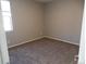 Bedroom with carpet, neutral walls, and one window at 4482 S Ukraine Ct, Aurora, CO 80015