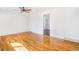 Spacious living room featuring hardwood floors, white walls and recessed lighting at 11976 E Arizona Dr, Aurora, CO 80012