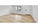 Spacious bedroom has natural light and wood laminate flooring at 12801 Randolph Pl, Denver, CO 80239
