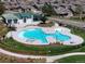 Aerial view of a modern community pool with unique design features and well-maintained landscaping at 2078 S Teller Ct, Lakewood, CO 80227