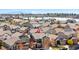 Aerial view of a neighborhood showcasing the home's location near a lake at 2078 S Teller Ct, Lakewood, CO 80227