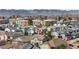 Aerial view of a neighborhood showcasing the home's location with mountain views in the background at 2078 S Teller Ct, Lakewood, CO 80227