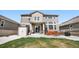 Inviting backyard with an orange outdoor seating set on the patio and a large storage shed at 2078 S Teller Ct, Lakewood, CO 80227