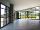 Bright sunroom featuring walls of windows and views of the landscaped yard at 2078 S Teller Ct, Lakewood, CO 80227