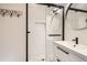 Updated bathroom with subway tile shower and modern vanity at 4418 Utica St, Denver, CO 80212