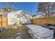 Detached garage and fenced backyard with patio at 4418 Utica St, Denver, CO 80212