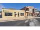 View of commercial buildings and street parking at 4418 Utica St, Denver, CO 80212