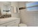 Beautiful bathroom with modern fixtures, subway tile, and decorative accent tile at 4835 Grove St, Denver, CO 80221