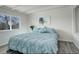 Serene bedroom featuring a comfortable bed, soft lighting, and a peaceful ambiance at 4835 Grove St, Denver, CO 80221