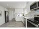 Updated kitchen featuring modern appliances, sleek countertops, and stylish finishes at 4835 Grove St, Denver, CO 80221