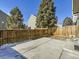 Small backyard with a concrete patio and wooden fence at 8448 W Union Ave # 9, Littleton, CO 80123