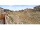 Expansive backyard view with a wooden fence showcasing the property line at 2326 Monte Vista St, Fort Lupton, CO 80621
