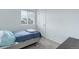 Bright bedroom featuring a window, carpeted floors and closet at 25812 E Cedar Pl, Aurora, CO 80018