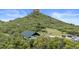 Scenic aerial view showcasing the property's covered outdoor picnic area and tree-lined surroundings, perfect for relaxation at 532 Oakwood Dr # D103, Castle Rock, CO 80104
