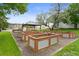 Community garden with raised garden beds and a shaded gazebo at 532 Oakwood Dr # D103, Castle Rock, CO 80104