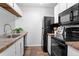 Efficient kitchen with modern appliances, ample cabinet space, and a well-lit sink area at 532 Oakwood Dr # D103, Castle Rock, CO 80104