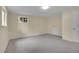 Carpeted bedroom with light-colored walls and trim with natural lighting from a window at 1330 Quari St, Aurora, CO 80011