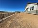 Spacious backyard with wrought iron fencing on a sunny day, ready for your customization at 16552 E 109Th Ave, Commerce City, CO 80022