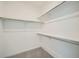 Walk-in closet with multiple levels of shelving, providing ample storage space at 16552 E 109Th Ave, Commerce City, CO 80022