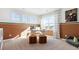 Bedroom with neutral decor featuring a seating area and a large window providing natural light at 22272 E 7Th Pl, Aurora, CO 80018