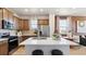 Modern kitchen featuring a central island, stainless steel appliances, and ample counter space at 22272 E 7Th Pl, Aurora, CO 80018