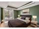 Comfortable bedroom featuring a balcony and a cozy rug at 4899 S Dudley St # 15G, Littleton, CO 80123