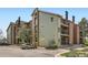 Exterior of a multi-story apartment building with parking at 4899 S Dudley St # 15G, Littleton, CO 80123