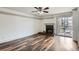Cozy living room features a fireplace and balcony access at 4899 S Dudley St # 15G, Littleton, CO 80123