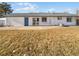 Spacious backyard with sliding glass doors and patio at 1584 S Salem Cir, Aurora, CO 80012