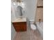 Cozy bathroom featuring vanity, toilet, and tiled shower-tub at 1584 S Salem Cir, Aurora, CO 80012