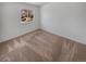 Bright bedroom with neutral walls, carpet and large window at 1584 S Salem Cir, Aurora, CO 80012