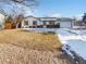 Charming single-story home featuring a manicured front yard with a two-car garage and lovely curb appeal at 1584 S Salem Cir, Aurora, CO 80012